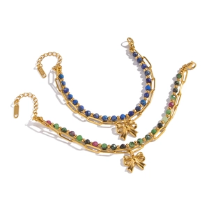 Vintage lapis lazuli beaded bracelet in 18K gold plated stainless steel with bow charm