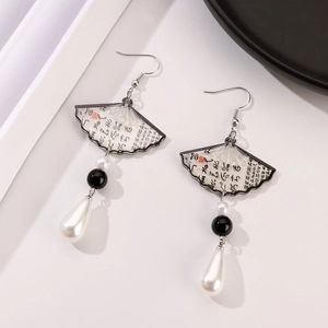 Detail of fan-shaped earring with calligraphy, pearls and black beads in Neo-Chinese style