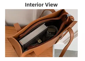 Top view showing the spacious interior compartment of the brown leather tote bag