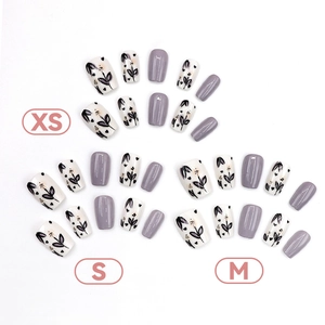 Short ballet purple floral press-on nails set in XS, S, and M sizes with a glossy finish