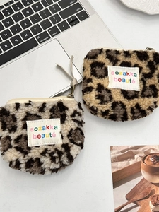 Plush leopard print coin pouches with fleece texture and zipper for small makeup storage