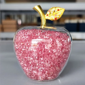 Crystal apple ornament with pink diamond filling and gold leaf detail for home decor