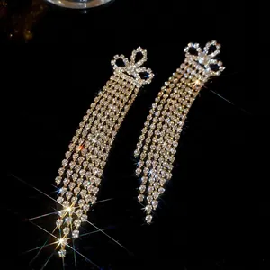 Sparkling silver butterfly long tassel earrings with rhinestones for elegant women