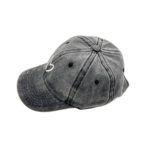 Detail view of washed dark grey cotton baseball cap with white embroidered B letter