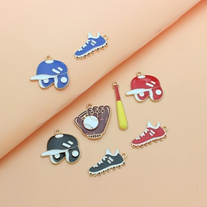 Detail of colorful baseball-themed enamel charms including caps, gloves and bats