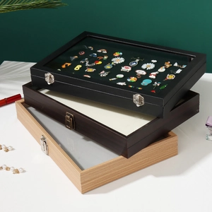 Wooden badge display box with glass lid and metal latch in black, brown and natural oak finish
