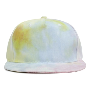 Detailed close-up of vibrant tie-dye canvas fabric on a kids flat-brim hip-hop cap