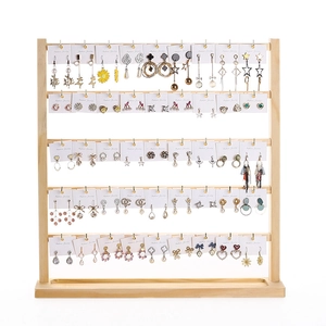 Five-tier solid wood earring organizer stand with multiple jewelry display slots