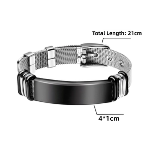 Detail view of woven stainless steel mesh bracelet with black plate and buckle closure