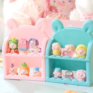 Cute mini pig figures on pastel tiered shelves with decorative animal ear tops