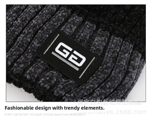 Detailed close-up showing the soft chenille knit texture and GD logo on the dark grey beanie