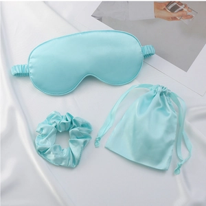 Three-piece silk sleep set with eye mask, scrunchie and drawstring bag in light blue