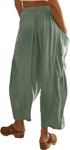 Détail du pantalon sarouel ample en coton et lin avec taille élastique et grandes poches