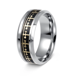 Macro detail of men's stainless steel wide ring with golden crosses on black inlay