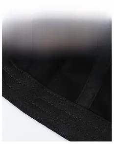 Detailed macro shot of the moisture-wicking sweatband and stitching inside the black cap