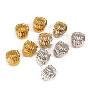 Shell-shaped titanium steel earrings in gold and silver finish with sparkling rhinestones