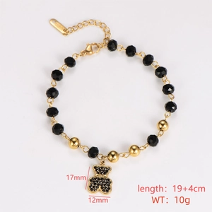 Detail shot of black beaded bracelet with golden bear charm and size measurements