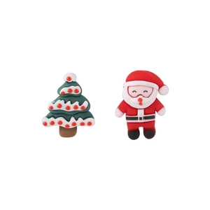 Detailed view of mini Christmas resin charms featuring a green tree and Santa Claus