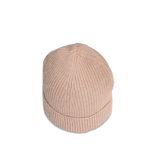 Close-up of the thick ribbed knit texture and wide folded brim on this apricot beanie hat
