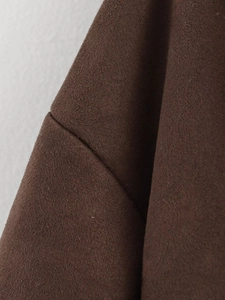 Close-up of premium coffee brown fleece jacket featuring reinforced shoulder stitching