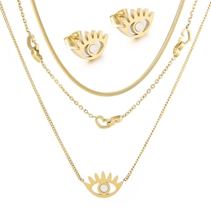 Three-layer gold necklace and stud earrings set with heart and evil eye charms