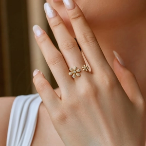 S925 sterling silver open ring with double floral design and cubic zirconia in gold