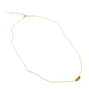 Minimalist gold titanium necklace for women with five small bead pendants on thin chain
