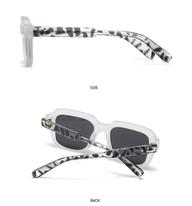 Detail of round sunglasses with leopard print temples and gold star rivet accents