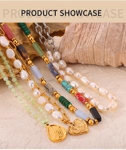 Macro shot of handmade titanium necklaces with natural stones and pearl pendants