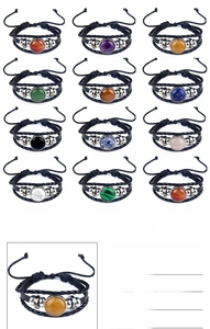Vue détaillée d'une pierre naturelle de 20 mm sertie sur un bracelet en cuir tressé double