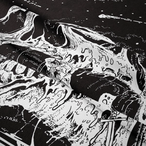 Close-up of Bohemian skull tapestry showing artistic monochrome fabric texture and details