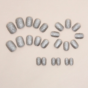 Short silver glitter press-on nail set with 24 pieces of sparkling almond false nails