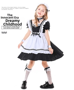 Detail of kids black and white maid cosplay outfit with ruffled apron and lace headband