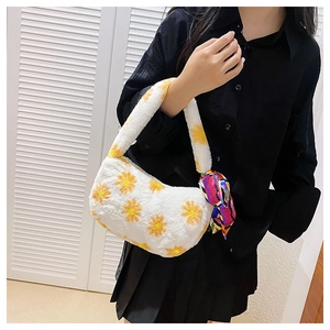 White fluffy plush handbag featuring yellow daisy patterns and a colorful silk scarf