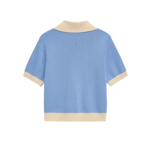 Blue and beige patchwork short sleeve knit sweater shown from a clean back view