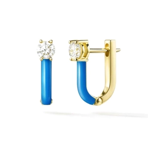Detailed view of U-shaped gold earrings with blue enamel and sparkling zircon accents