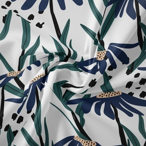 Detailed close-up of bohemian floral print fabric showing soft texture and drape