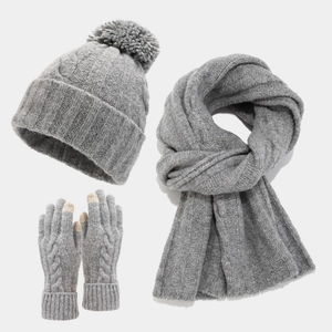 Three-piece winter knit set with pompom beanie, scarf, and touchscreen gloves in grey