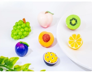 Macro detail of realistic resin miniature tropical fruits for DIY crafts and dollhouses