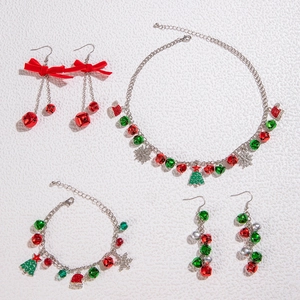 Detailed set of Christmas jewelry featuring red and green bells with snowflake charms