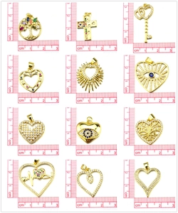 Detailed size measurement chart for assorted gold-plated tree of life and cross pendants