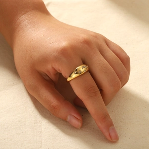 Polished 18K gold-plated stainless steel star and moon ring with zircon on hand