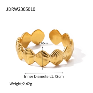 18k gold plated stainless steel open ring featuring a minimalist seashell textured band