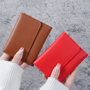Minimalist trifold slim faux leather wallet in brown and red with litchi grain texture