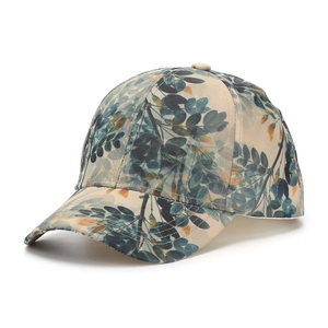 Detailed close-up of ethnic floral patterns on a cotton baseball cap with professional stitching