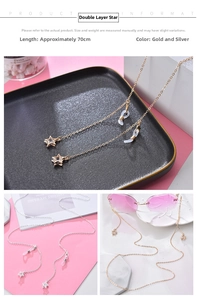 Detail of 70cm double-layered star glasses chain with zircon pendants in gold and silver
