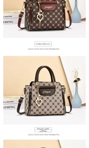Detail view of monogram handbags in coffee red and khaki coffee with golden heart pendants