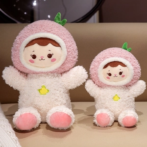 Plush peach girl doll set with pink faux fur and star embroidery on cozy sofa