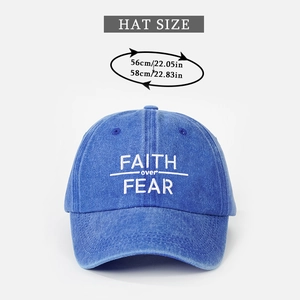 Detail showing Faith Over Fear embroidery and size specifications for the blue cotton cap