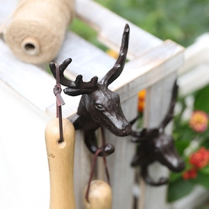Rustic cast iron deer head wall hook with vintage brown finish for home decor